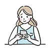 テーブルでスマートフォンを操作して笑顔の女性のイラスト