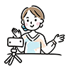 スマートフォンでライブ配信をする女性のイラスト