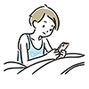 ベッドでスマートフォンを操作する男性のイラスト